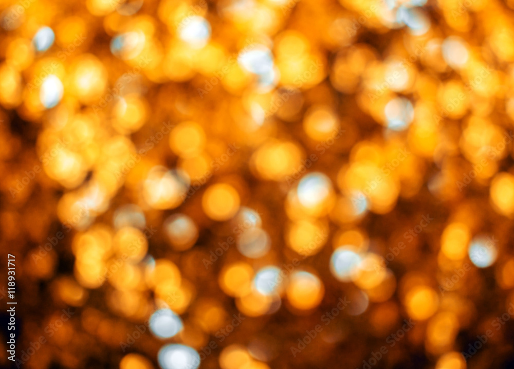Holiday blurred bokeh golden color.