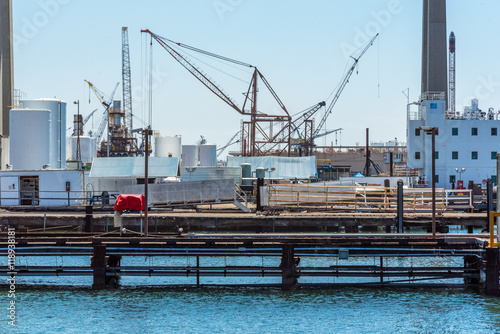 loading or discharging tower crane at a sea port photo