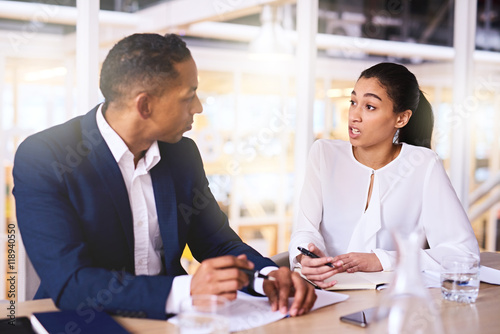Proposal being made by young professional woman to a wealthy male investor whom could fund her new business venture and possibly be her business partner in future.