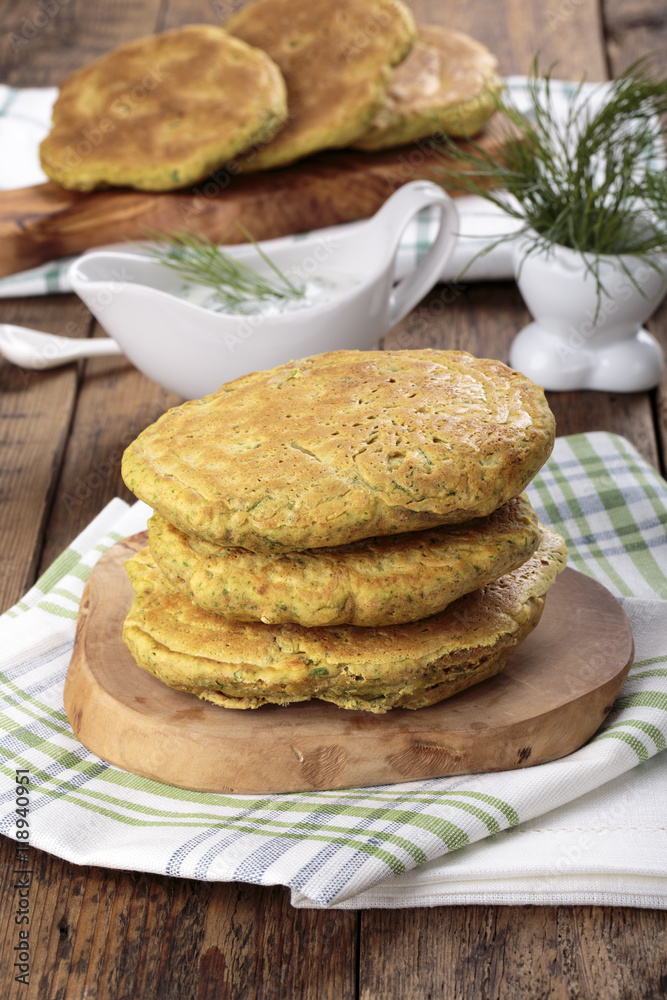 Pancakes made from corn flour with spinach and herbs Pancakes made from corn flour with spinach and herbs