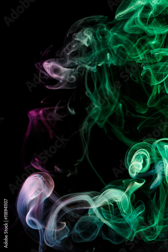 Abstract purple emerald smoke from aromatic sticks. © Vagengeim