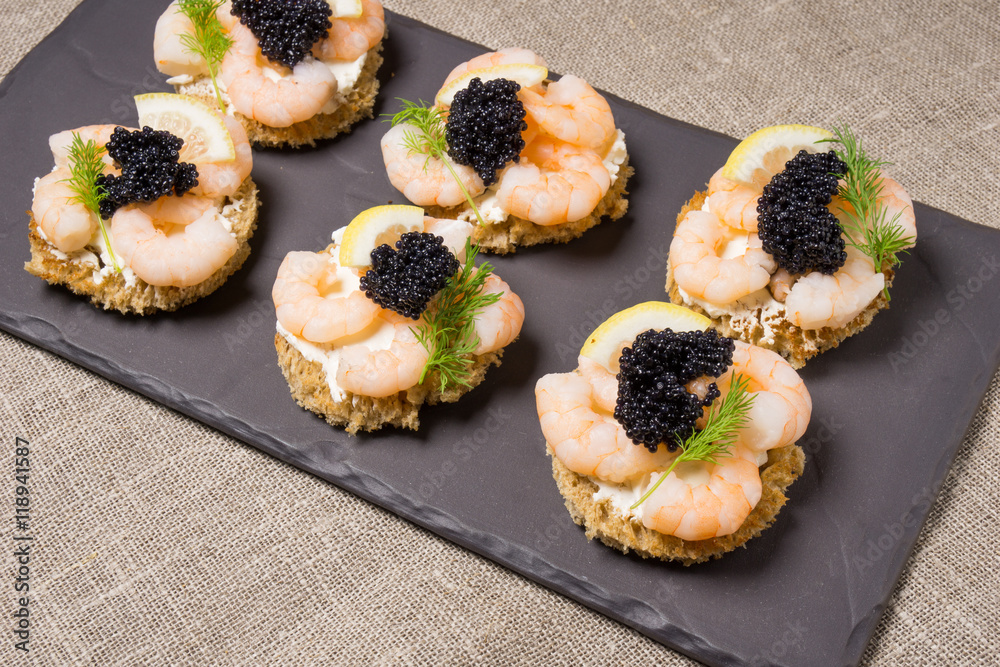 Shrimp Appetizer served on toasted bread Shrimp Appetizer served on toasted bread