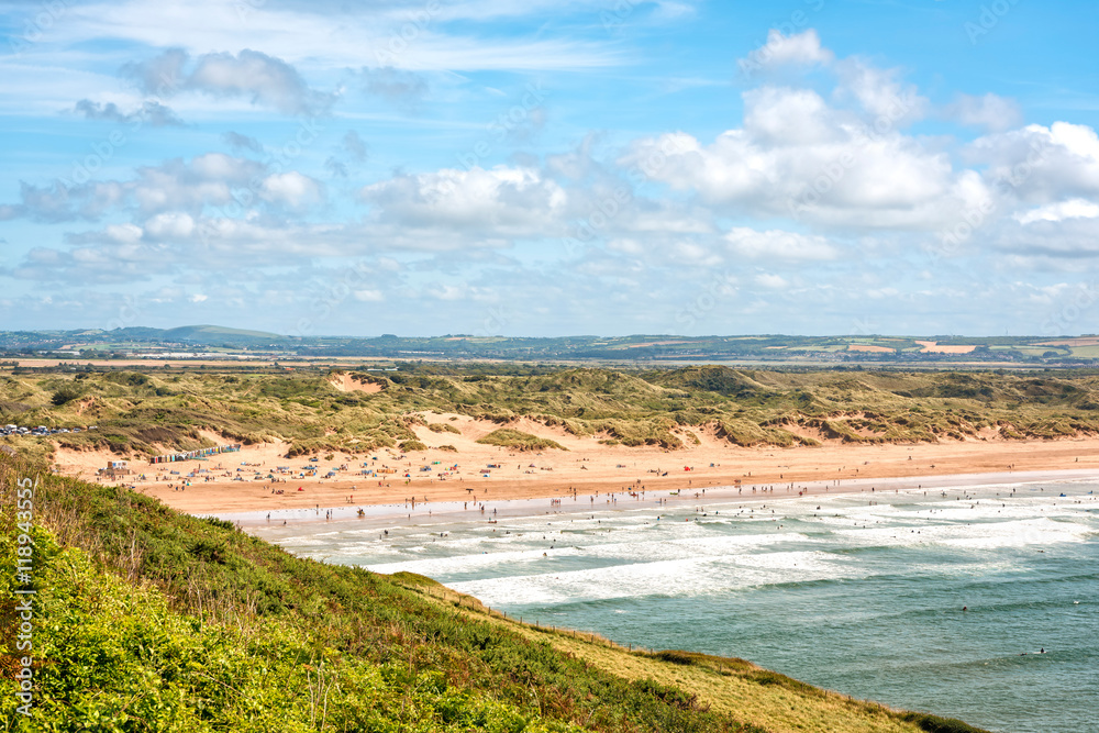 Braunton, United Kingdom - August 13, 2016: Saunton beach is a key component of North Devon's golden coast,  part of UNESCO Biosphere Reserve. It is popular beach with surfers and families. 