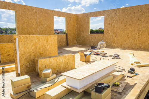 Schilderij op canvas Building wooden houses