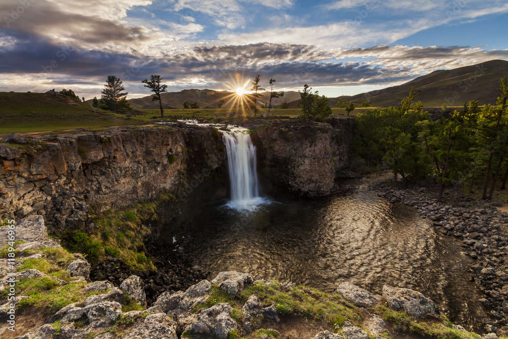 Fototapeta premium Landscape with a view of the waterfall and beautiful sky. Mongol
