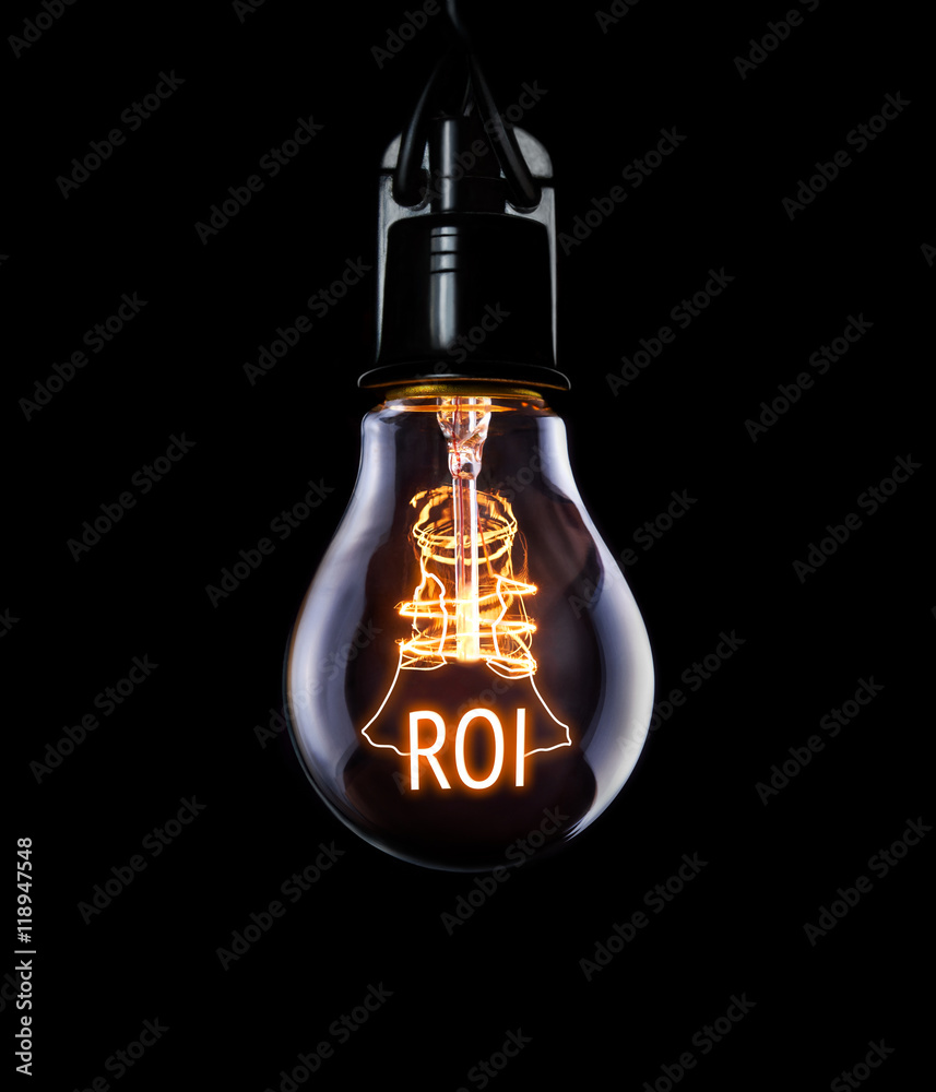 Hanging lightbulb with glowing Return on Investment concept.