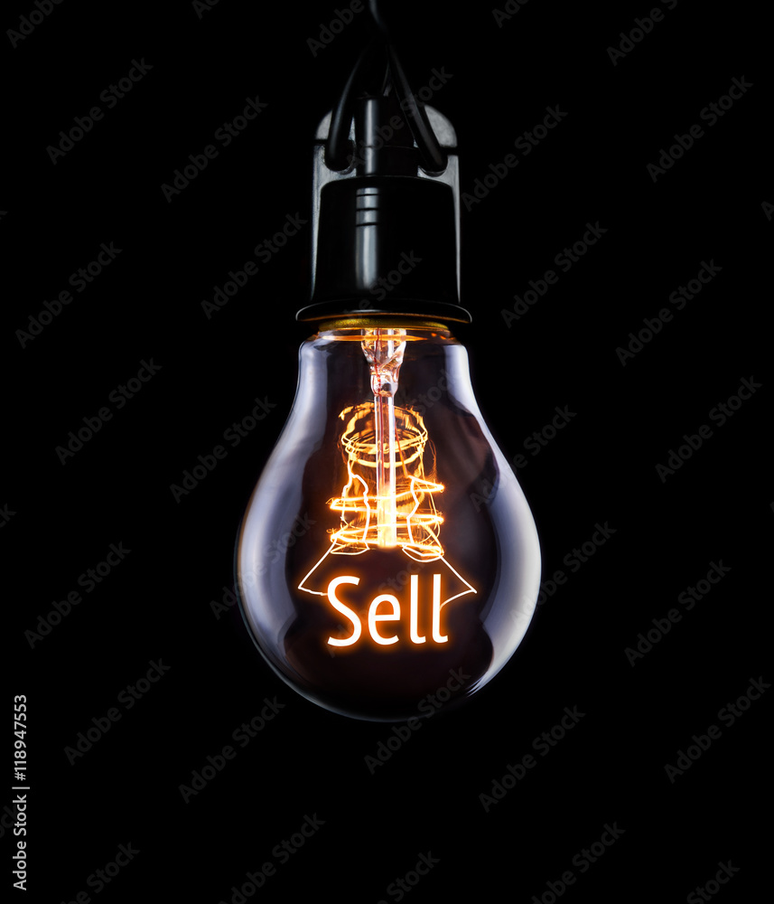 Hanging lightbulb with glowing Sell concept.
