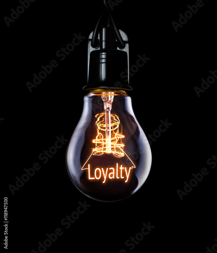 Obraz na płótnie Hanging lightbulb with glowing Loyalty concept. w salonie