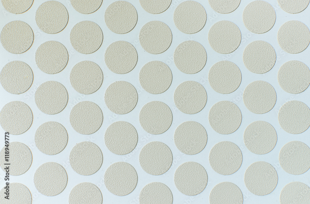 Beige circles on a white background.
