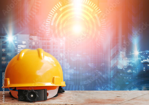 Safety helmet with construction site background 