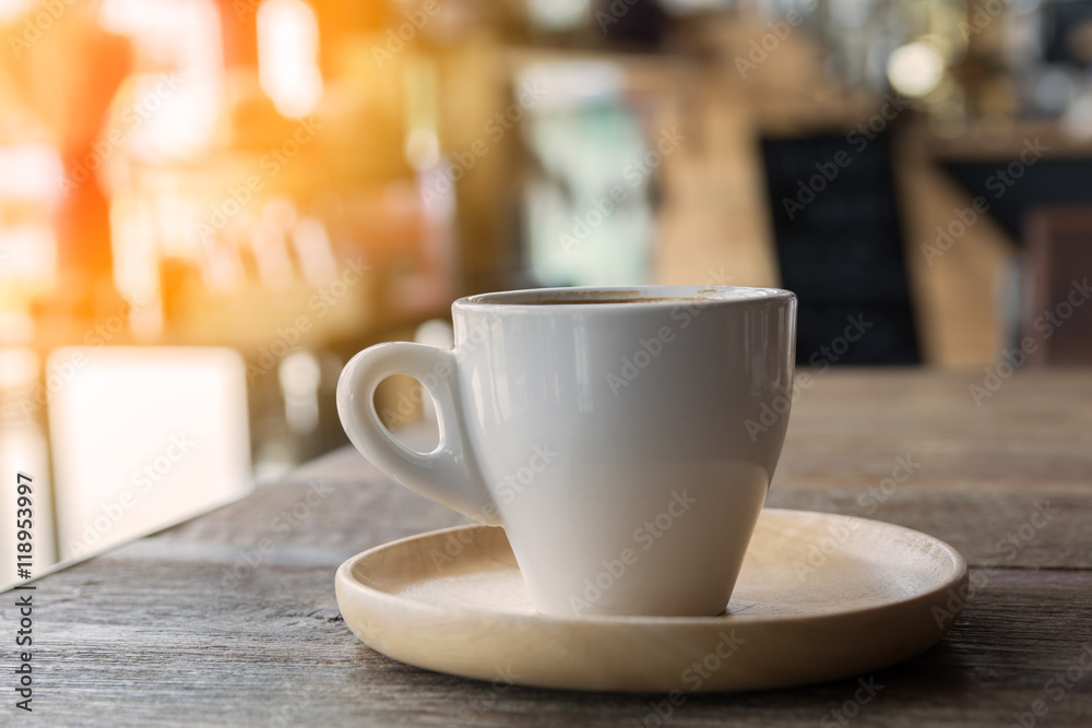 coffee cup on wood plate and table in morning coffee cup on wood plate and table in morning