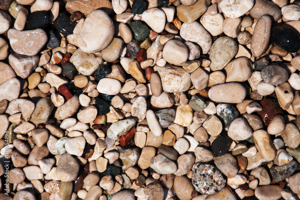 stones on beach and sea water stones on beach and sea water