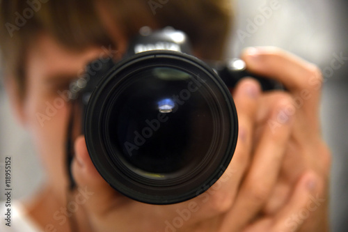 Self auto portrait camera lens in mirror photographer journalist photo