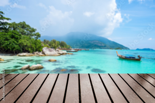 Wood table top on blurred ko lipe tourist attraction wonderful of south