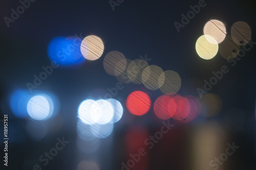 Beautiful background on dark, out of Focus Lights during the Night. © hxdyl