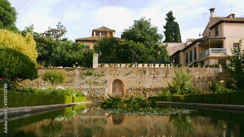 Gardens of the Generalife in Alhambra. Granada, Spain, beautiful 4k footage with the reflections in the pool