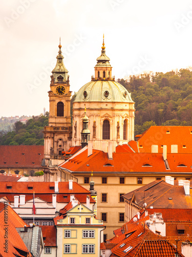 Robust baroque dome of St. Nicholas Cahtedral in Lesser Town of Prague, Czech Republic photo