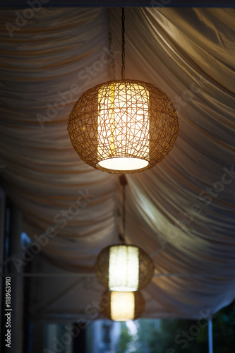 included chandeliers in the evening cafe outdoor © timonko