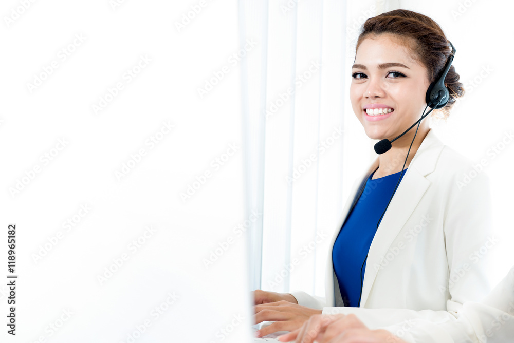Smiling woman with headphone as an operator Smiling woman with headphone as an operator