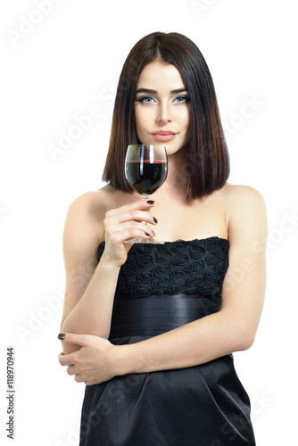 Portrait of beautiful young woman with glass of wine, over white