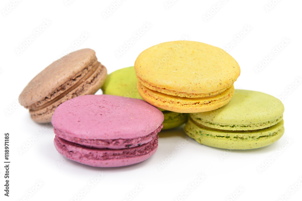 French colorful macarons isolated on white. Tasty, diet, gourman French colorful macarons isolated on white. Tasty, diet, gourman