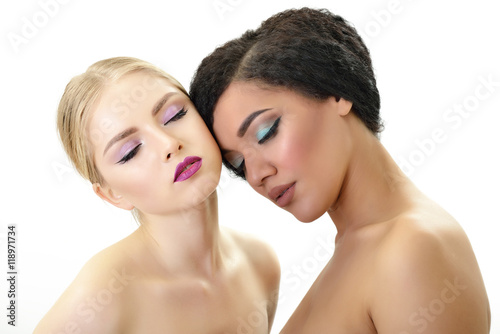 Makeup. Double female portrait. Caucasian blond girl and beautif