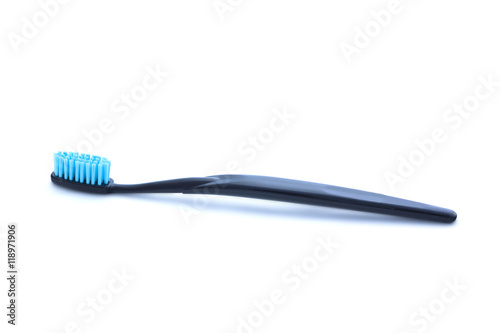 Black toothbrush on white background