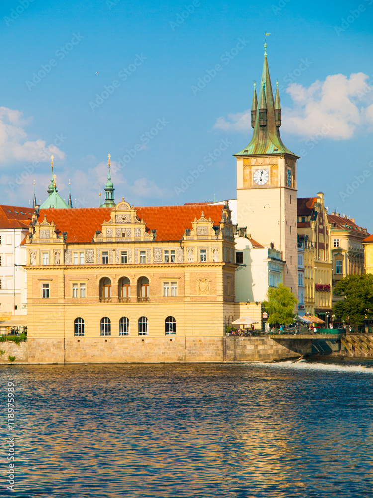 Smetana embankment with Smetana's Museum and Old Town Water Tower on Mlynec Peninsula, Prague, Czech Republic