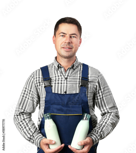 Tableau sur toile Milkman with bottles on white background
