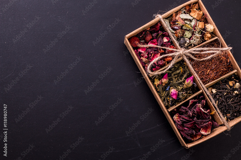 assortment of dry tea on a wooden table,healthy drink assortment of dry tea on a wooden table,healthy drink