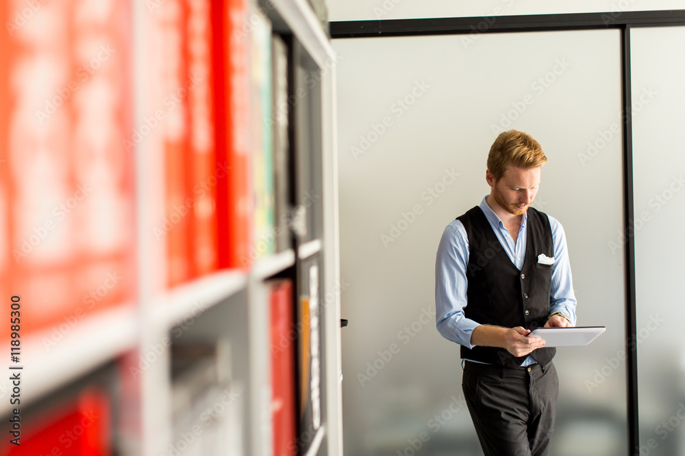 Fototapeta premium Young man with tablet