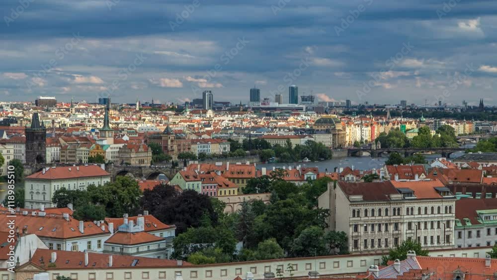 Panorama of Prague Old Town with red roofs timelapse, famous Charles bridge and Vltava river, Czech Republic. Panorama of Prague Old Town with red roofs timelapse, famous Charles bridge and Vltava river, Czech Republic.