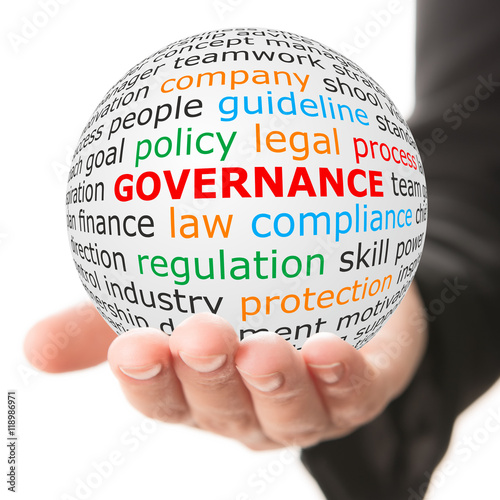Governance concept. Hand take white ball with wordcloud and governance word in red color.