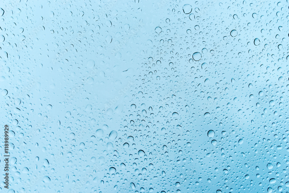 Rain dew drop on dirty glass with dirt dust and scratches, selective focus with vintage color tone effect,Water Abstract background. Rain dew drop on dirty glass with dirt dust and scratches, selective focus with vintage color tone effect,Water Abstract background.