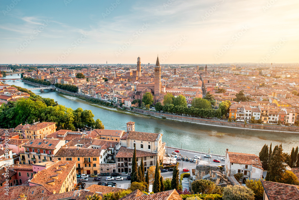 Panoramic aerial view on Verona old town from the castle hill on the sunset