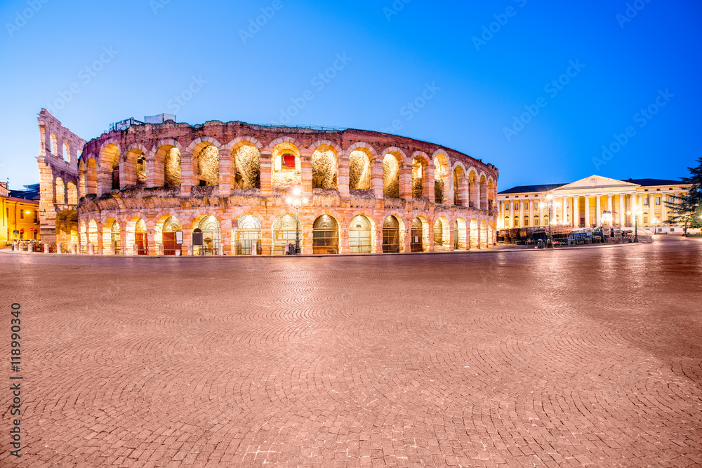 Night view on illuminated Arena on Bra square in Verona city