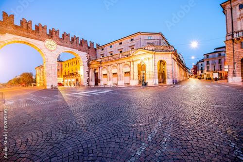 Night view on illuminated Portoni della Bra gate with museum in Verona city.