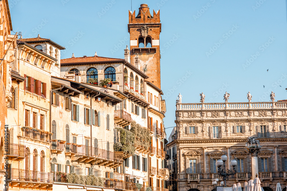 Buildings with Gardello tower on Erbe square in Verona city