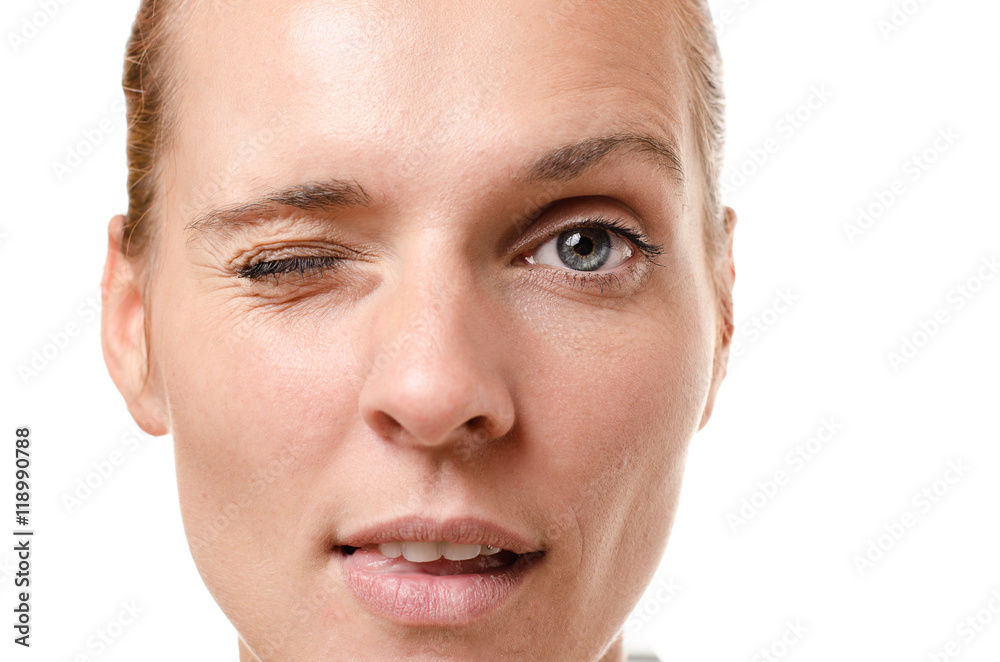 Sensual young woman winking at the camera Sensual young woman winking at the camera