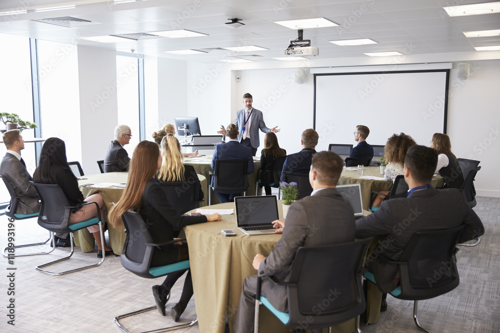 Businessman Making Presentation At Conference