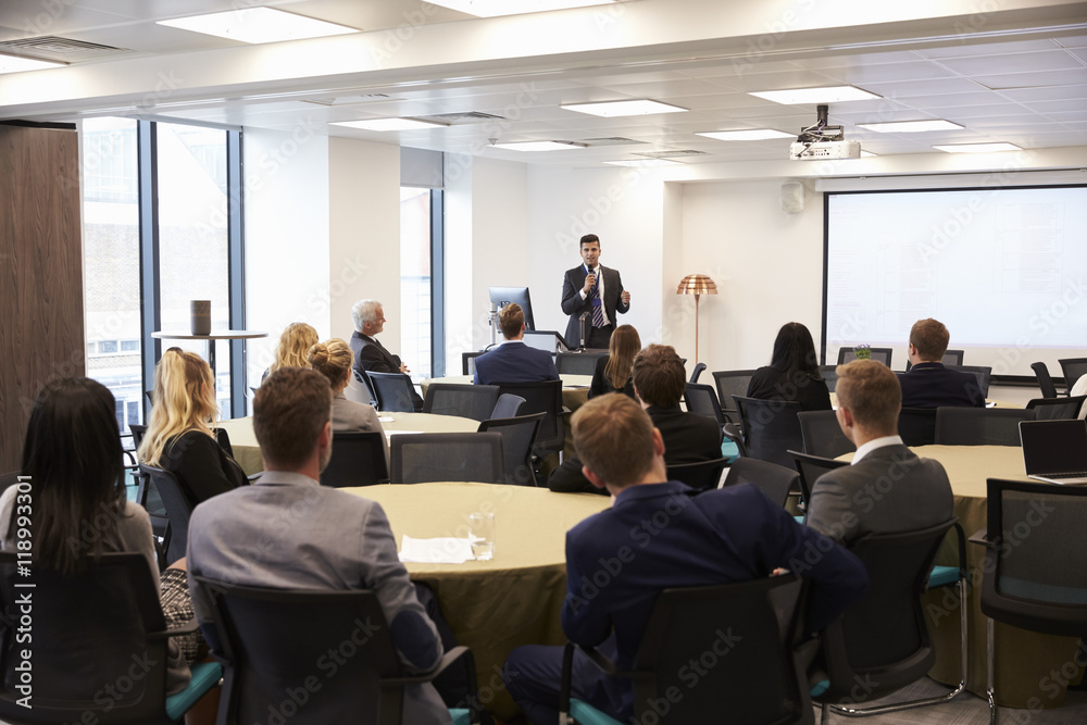 Businessman Making Presentation At Conference