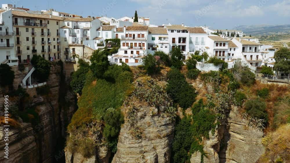 4k Ronda, Spain. Panoramic view of the old city of Ronda, the famous white village. The New Bridge. Province of Malaga, Andalusia, Spain