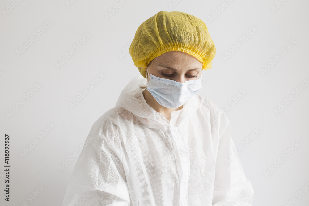 Woman in white protective suit Woman in white protective suit