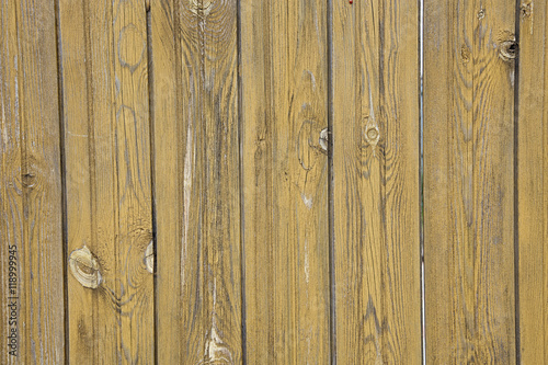 Old wooden plank pale yellow background