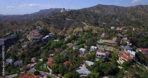 Griffith Park Observatory Fly Over / Multiple clips flying over Griffith Observatory with the Hollywood sign and downtown Los Angeles skyline in the background.