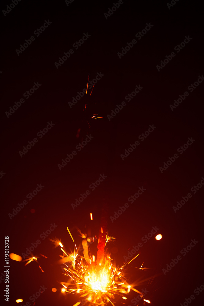 Obraz premium Christmas background with sparkler light and copy-space