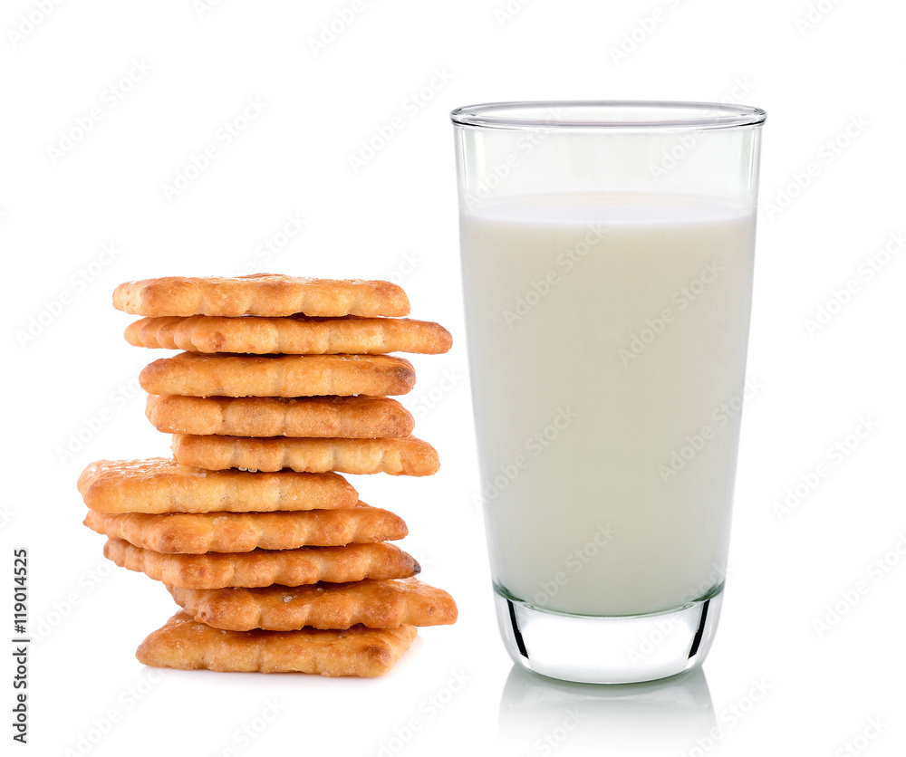 glass of milk and butter biscuits on white background glass of milk and butter biscuits on white background