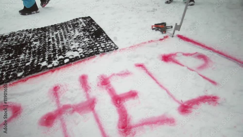 Red spray mark for snowboarders on trail. Snowy mountains. Contest. Ski resort. Challenge. Competition. Red spray mark for snowboarders on trail. Snowy mountains. Contest. Ski resort. Challenge. Competition.