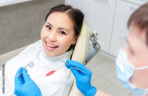Young female patient at dentist office