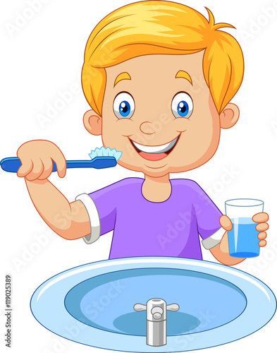 Cute little boy brushing teeth